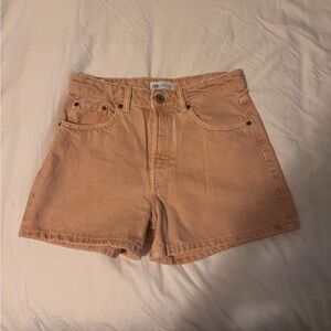 Salmon colored denim shorts, size USA 6